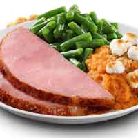 Photo of plate with ham, green beans, and sweet potatoes